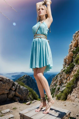 Woman tied out outdoors with hands above head