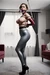 In latex, ballgag and tight waist cincher