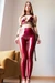 AI woman in red latex leggings tied up