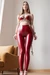 AI woman in red latex leggings tied up