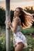 Busty woman in loose sundresses, tied up to the