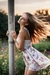 Busty woman in loose sundresses, tied up to the