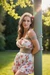 Busty woman in loose sundresses is being tied up