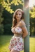 Busty woman in loose sundresses is being tied up