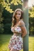 Busty woman in loose sundresses is being tied up