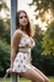 Busty woman in loose sundresses is being tied up