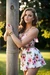 Busty woman in loose sundresses, tied up to the