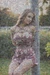 Busty woman in loose sundresses is being tied up