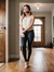 AI generate brunette in ballgag standing in hallway