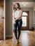 AI generate brunette in ballgag standing in hallway