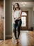 AI generate brunette in ballgag standing in hallway